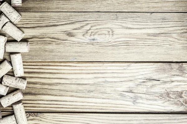 Close-up of wine corks in horizontal format on a wooden background