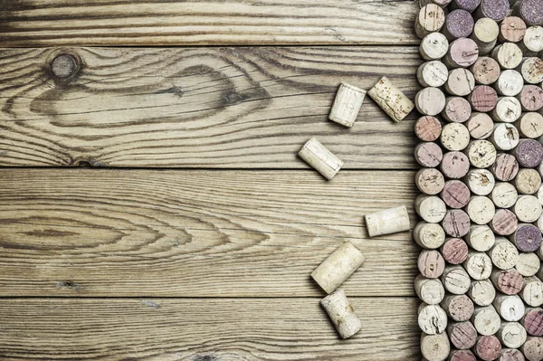 Close-up of wine corks in horizontal format on a wooden background