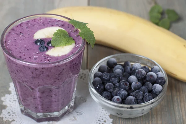 Smoothies of frozen   blueberries and banana with yogurt.