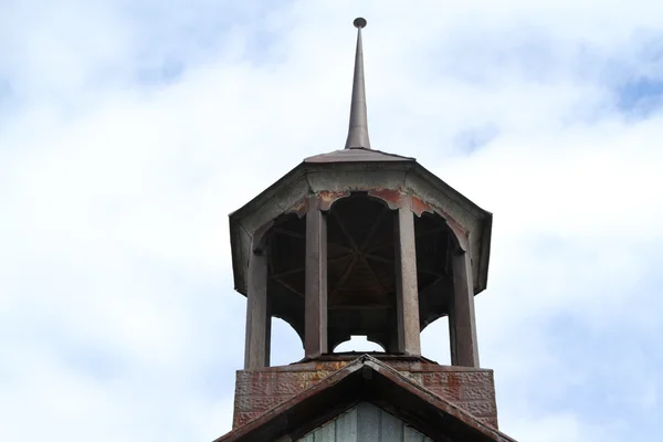 Vintage cupola poised over building