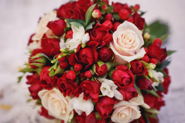 Brides bouquet of red and white roses