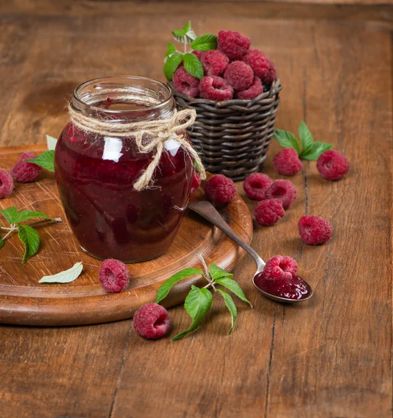 Jar of homemade raspberry and fresh berry