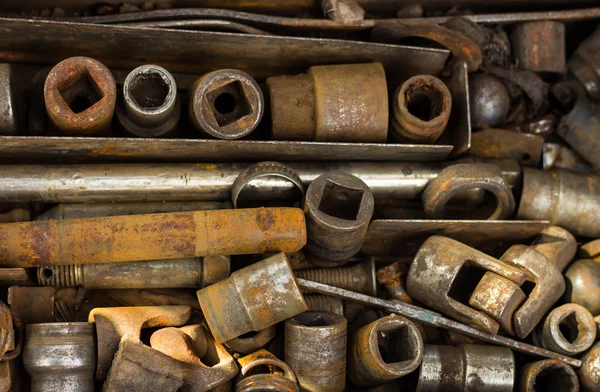 Set of old tools, screws and nuts