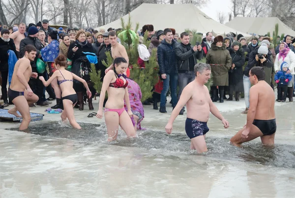 Religious holiday of Epiphany . People bathe in winter in the river  Samara city Novomoskovsk Dnipropetrovsk region