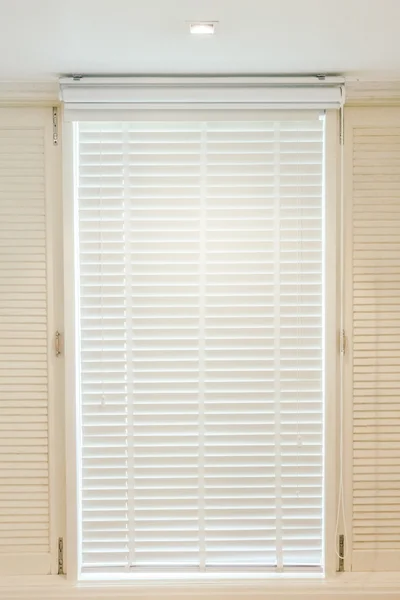 Blinds window in bedroom interior