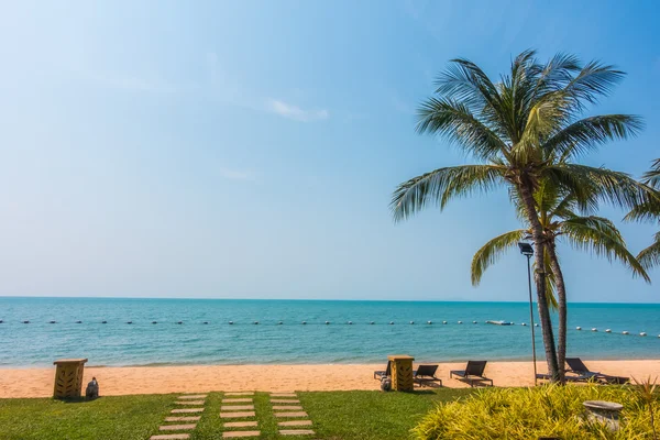 Beautiful beach and sea with palm trees