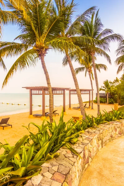 Beautiful beach and sea with palm trees