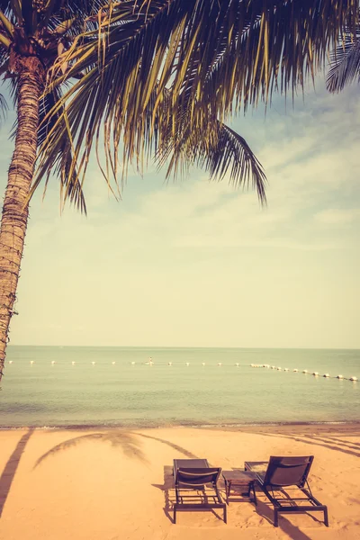 Beautiful beach and sea with palm tree