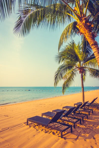 Beautiful beach and sea with palm trees