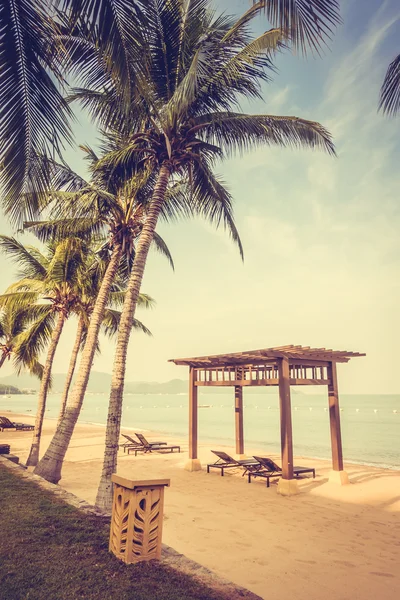 Beautiful beach and sea with palm trees