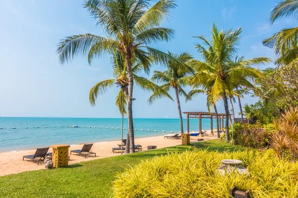 Beautiful beach and sea with palm trees