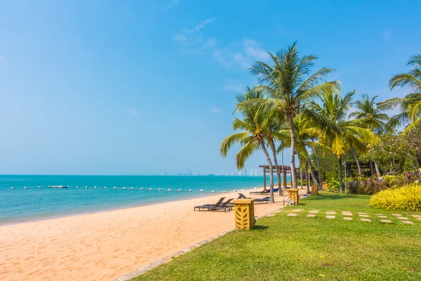 Beautiful beach and sea with palm trees