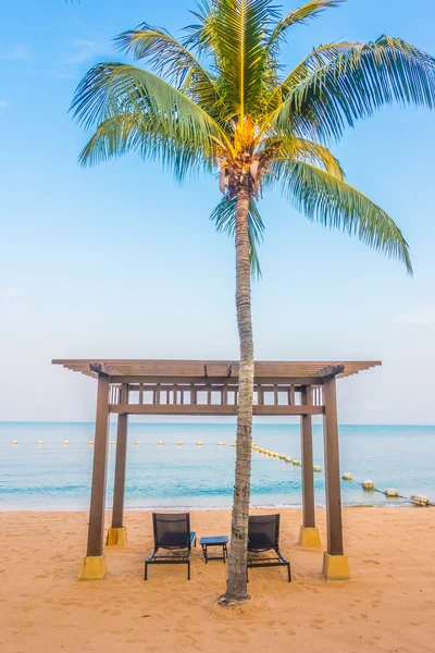 Beautiful beach and sea with palm tree