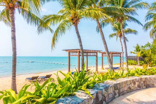 Beautiful beach and sea with palm trees