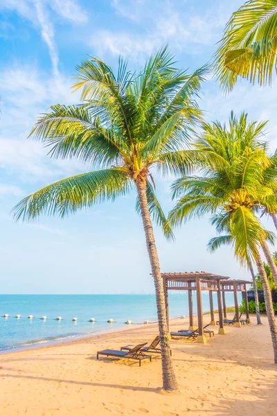 Beautiful beach and sea with palm trees
