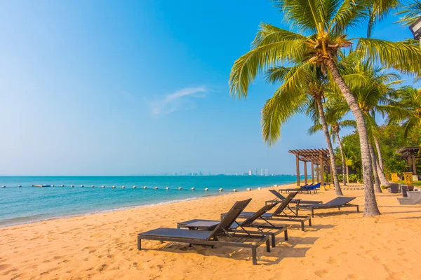 Beautiful beach and sea with palm trees