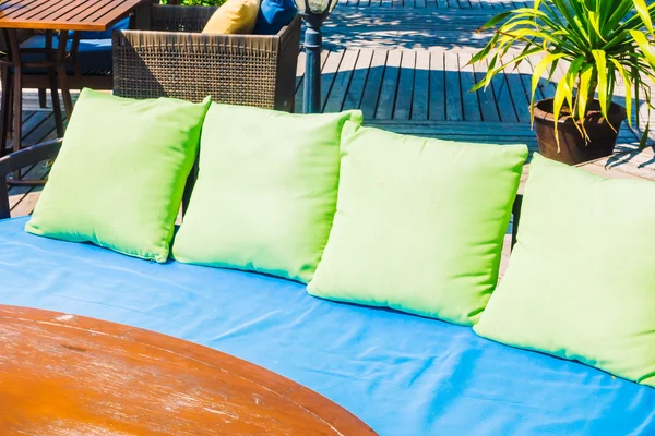 Outdoot patio with pillows on sofa