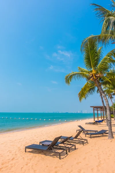 Beautiful beach and sea with palm trees