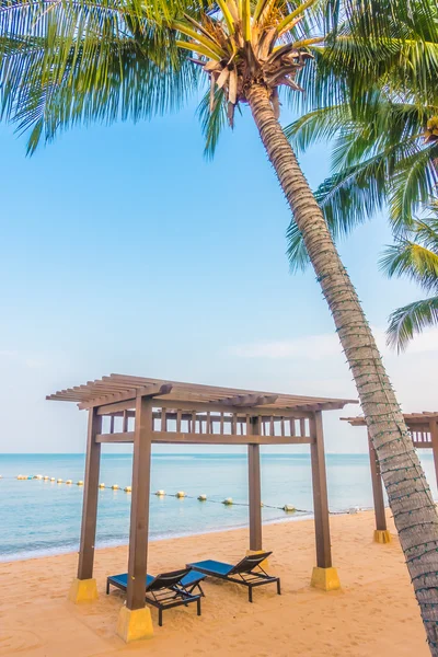 Beautiful beach and sea with palm tree