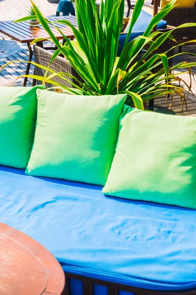 Outdoot patio with pillows on sofa