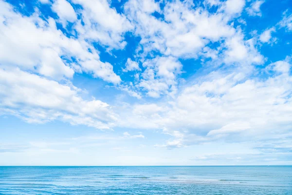 White cloud on blue sky and sea