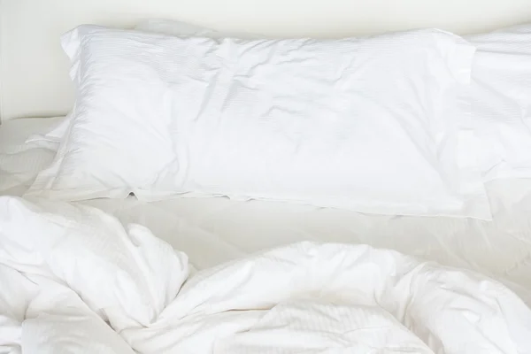 White sheet pillows