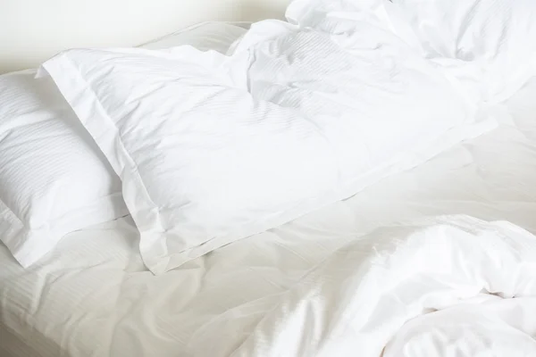 White sheet pillows