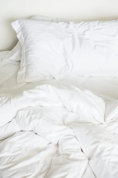 White sheet pillows
