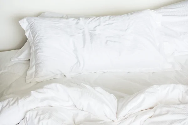 White sheet pillows