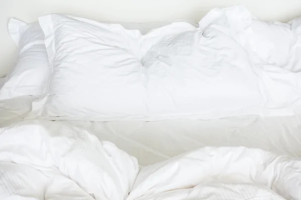 White sheet pillows