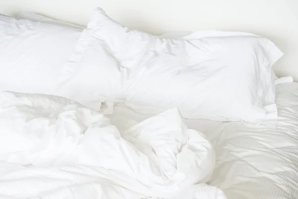 White sheet pillows