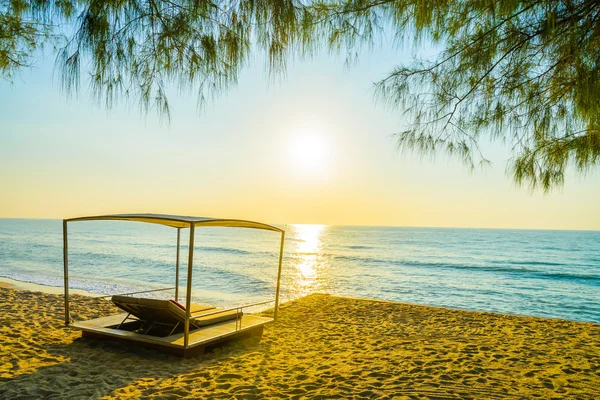 Beach bed with sun flare