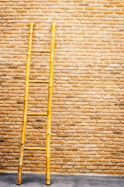 Wood stair on brick wall