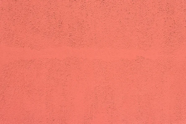 Pink and red concrete wall