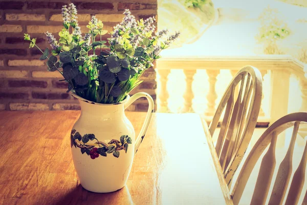 Vase plant decoration with outdoor view