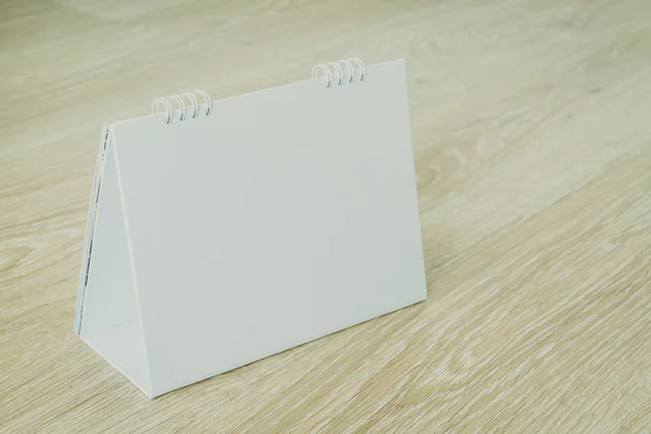 Blank calendar on wood