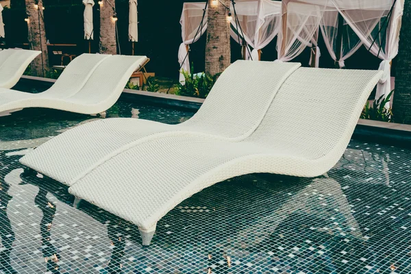 Pool Chairs in hotel swimming pool