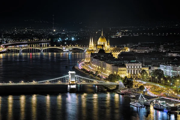 Night view of the Hungarian Parliament Building and Szechenyi Chain Bridge in Budapest