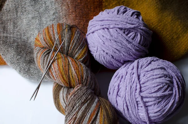 Balls of woolen threads for knitting
