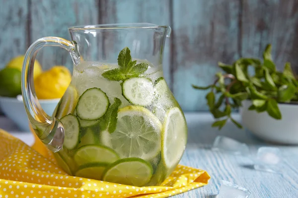 Fruit water in glass pitcher