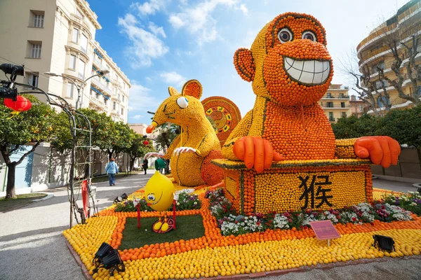 MENTON, FRANCE - FEBRUARY 20: Chinese horoscope monkey and mouse made of oranges and lemons on Lemon Festival (Fete du Citron) on the French Riviera.The theme for 2015 was \