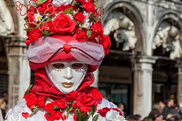 Carnival floral Mask in St Mark\'s square, Venice