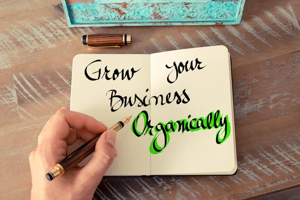 Handwritten text Grow Your Business Organically
