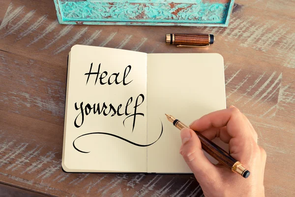 Handwritten text Heal Yourself as success and evolution concept image