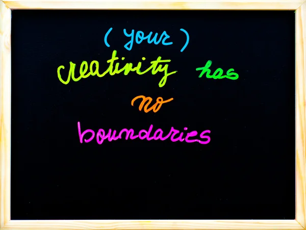Your creativity has no boundaries message, handwriting with chalk on wooden frame blackboard, free thinking concept