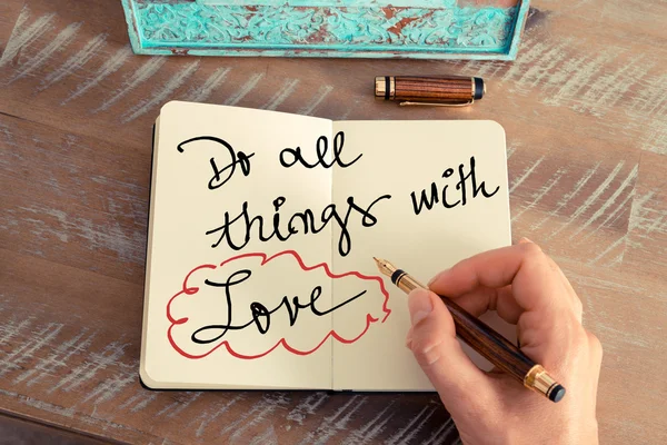 Handwritten text DO ALL THINGS WITH LOVE
