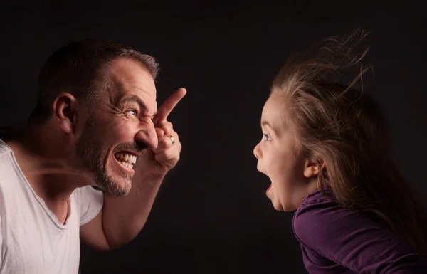 Angry Father with astonished daughter