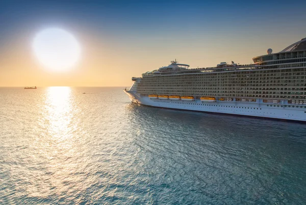 Cruise Ship Sailing at Sunset