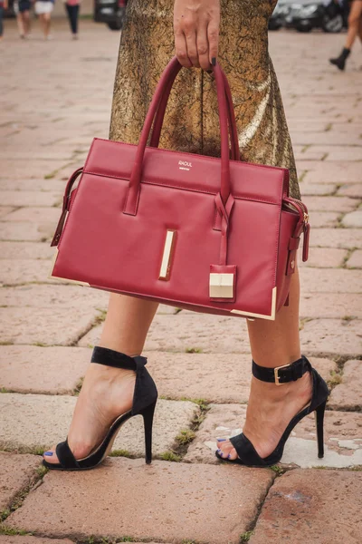 Detail of bag and shoes outside Cavalli fashion shows building for ...