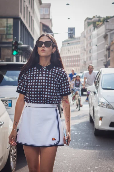 Woman outside Trussardi fashion shows building for Milan Women's Fashion Week 2014